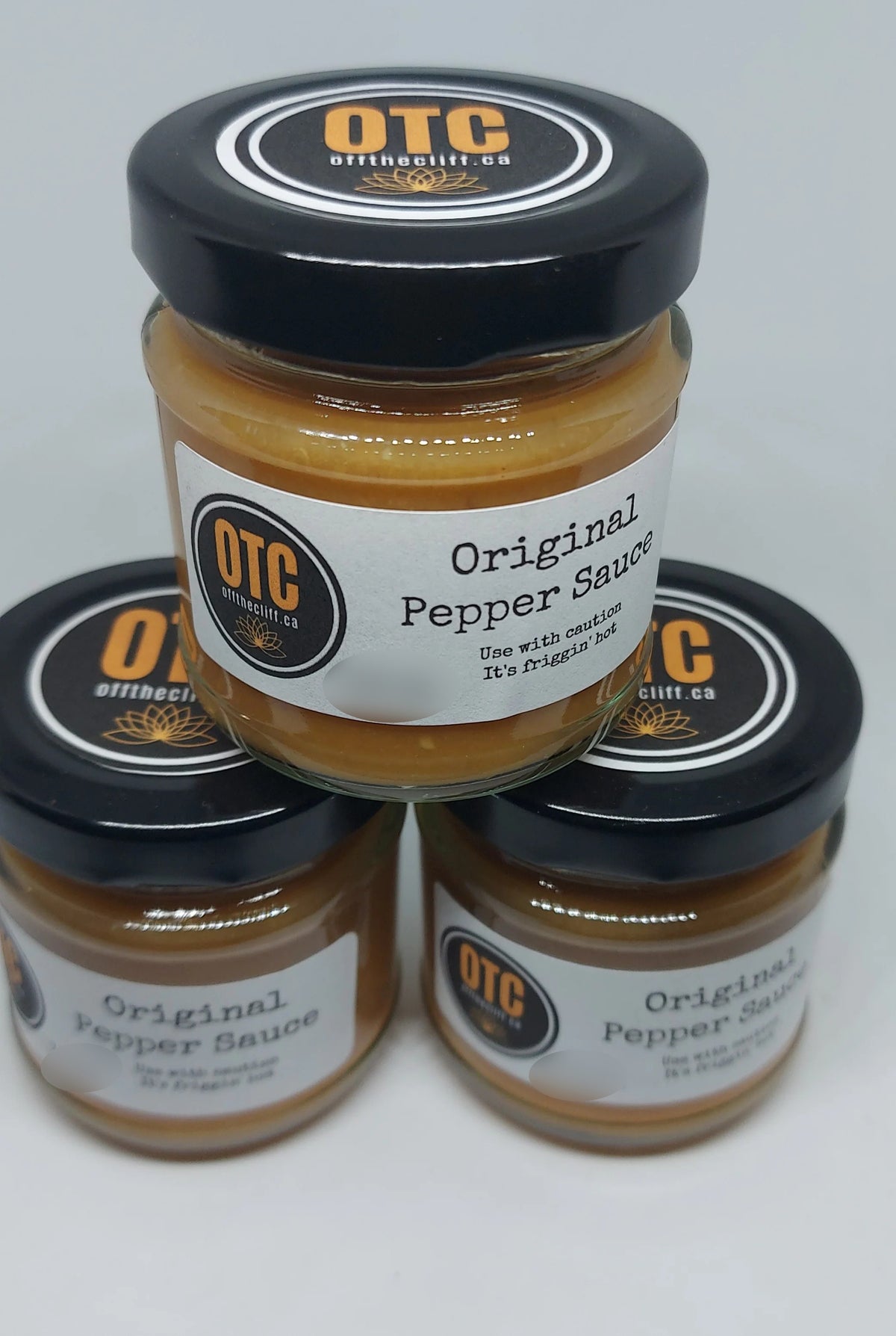 OTC Original Pepper Sauce jars stacked